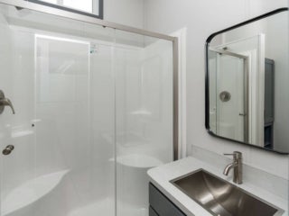 The bathroom inside of a park model cabin at Point Sebago Resort in Casco, Maine.