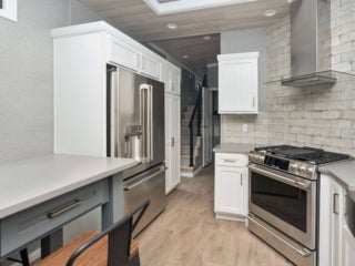 Inside the kitchen of a park model cabin at Point Sebago Resort in Casco, Maine.