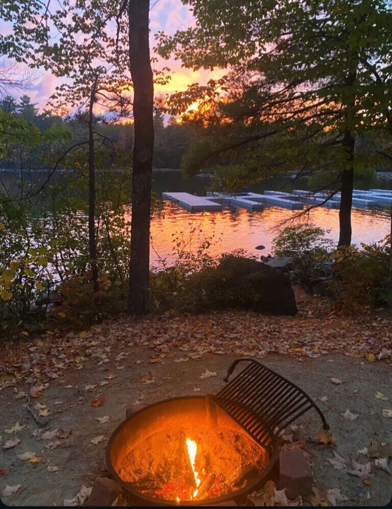 Campfire in October along the shores of Sebago Lake in Casco, Maine.