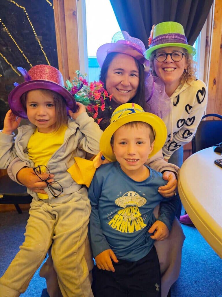 Opening_Weekend_PSR10 Guests wearing colorful hats on Derby Day at Point Sebago Resort
