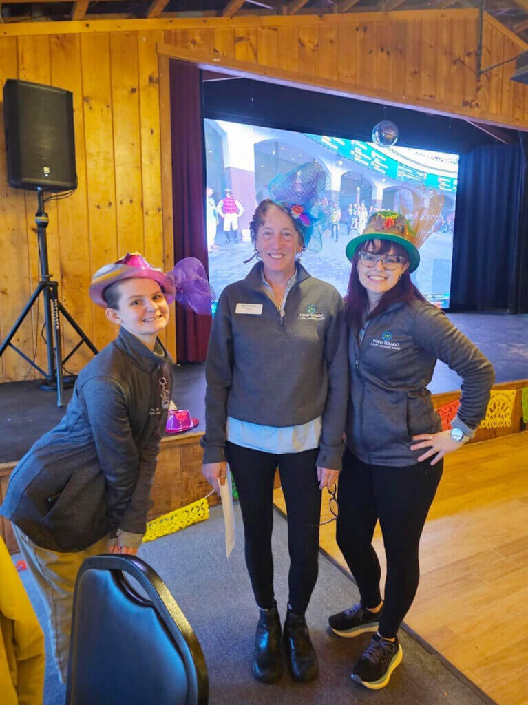 Opening_Weekend_PSR_3 Staff wearing colorful hats on Derby Day at Point Sebago Resort