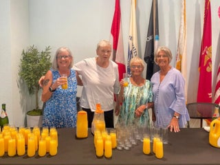 Ladies with mimosas at the Mother's Day Brunch at Rolling Greens Village a 55+ community in Ocala, Florida.