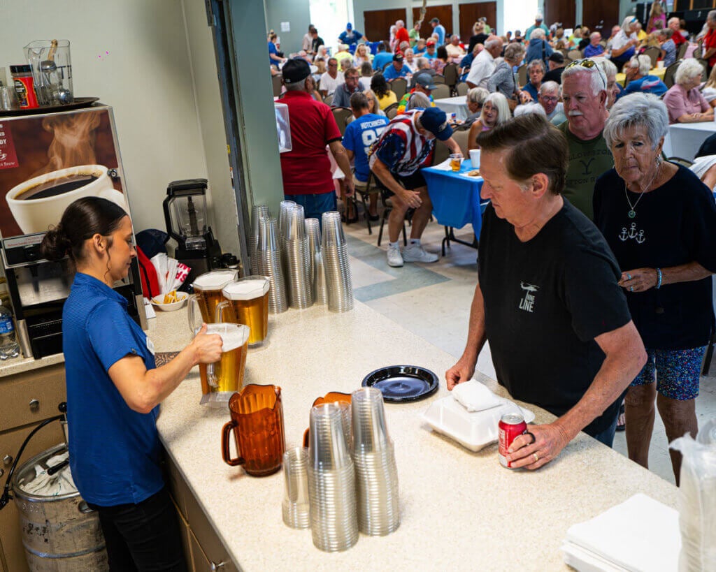 Residents lined up for beer at the Resident Picnic in Cypress Lakes Village in Lakeland, Florida.