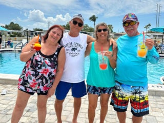 Residents enjoying the Luau Pool Party at The Meadows in Tarpon Springs, Florida