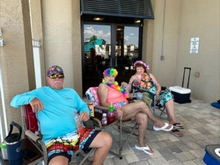 Residents enjoying the Luau Pool Party at The Meadows in Tarpon Springs, Florida