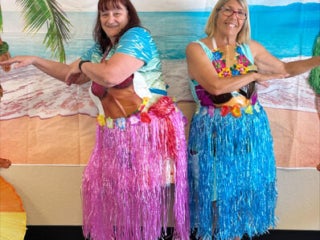 Residents enjoying the Luau Pool Party at The Meadows in Tarpon Springs, Florida