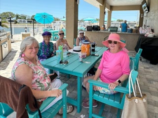 Residents enjoying the Luau Pool Party at The Meadows in Tarpon Springs, Florida