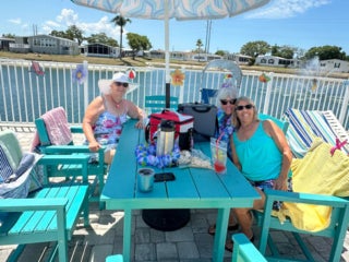 Residents enjoying the Luau Pool Party at The Meadows in Tarpon Springs, Florida