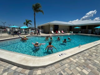 55+ residents in the outdoor pool at The Meadows in Tarpon Springs, Florida.