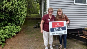 Lori Galford in 2026 at Point Sebago Resort outside of a cottage home she sold.