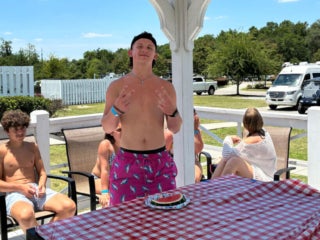 Guests at Creekfire RV Resort in Savannah, Georgia participating in a watermelon eating contest