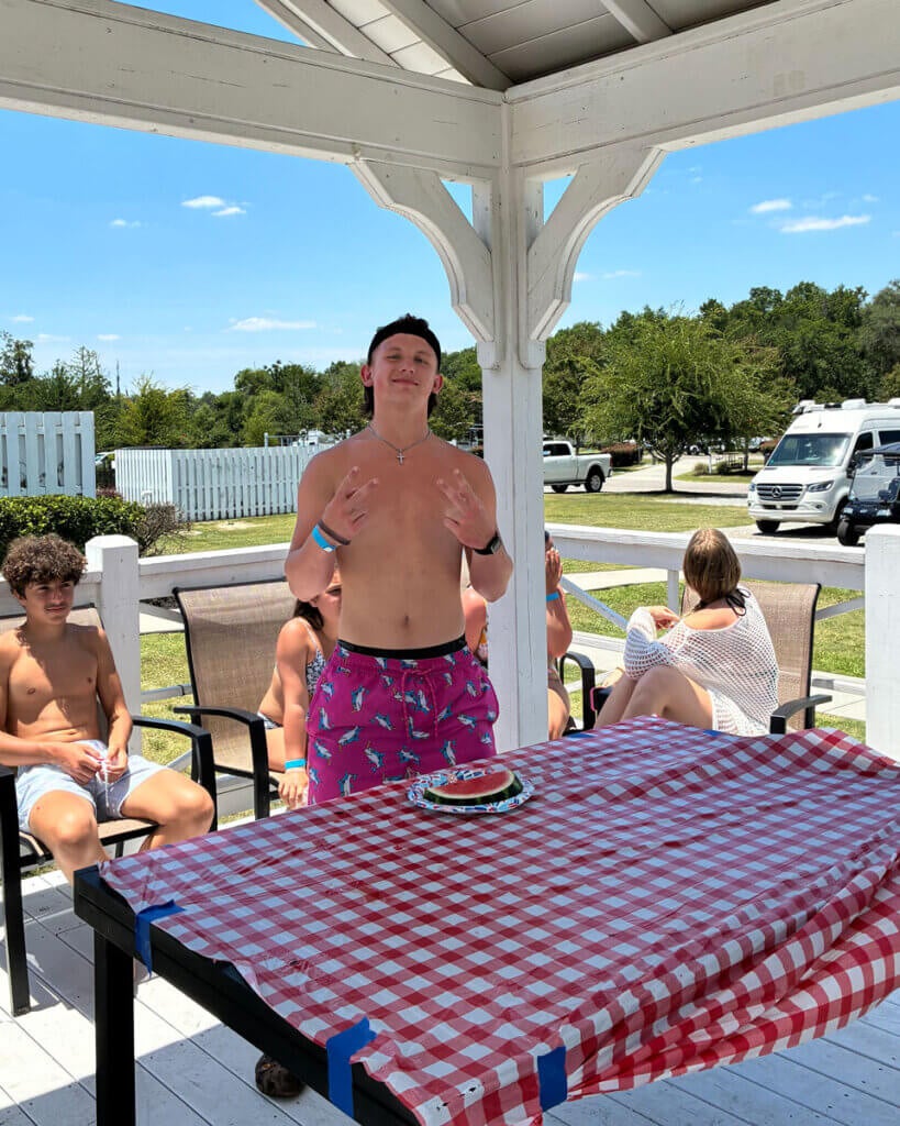 Guests at Creekfire RV Resort in Savannah, Georgia participating in a watermelon eating contest