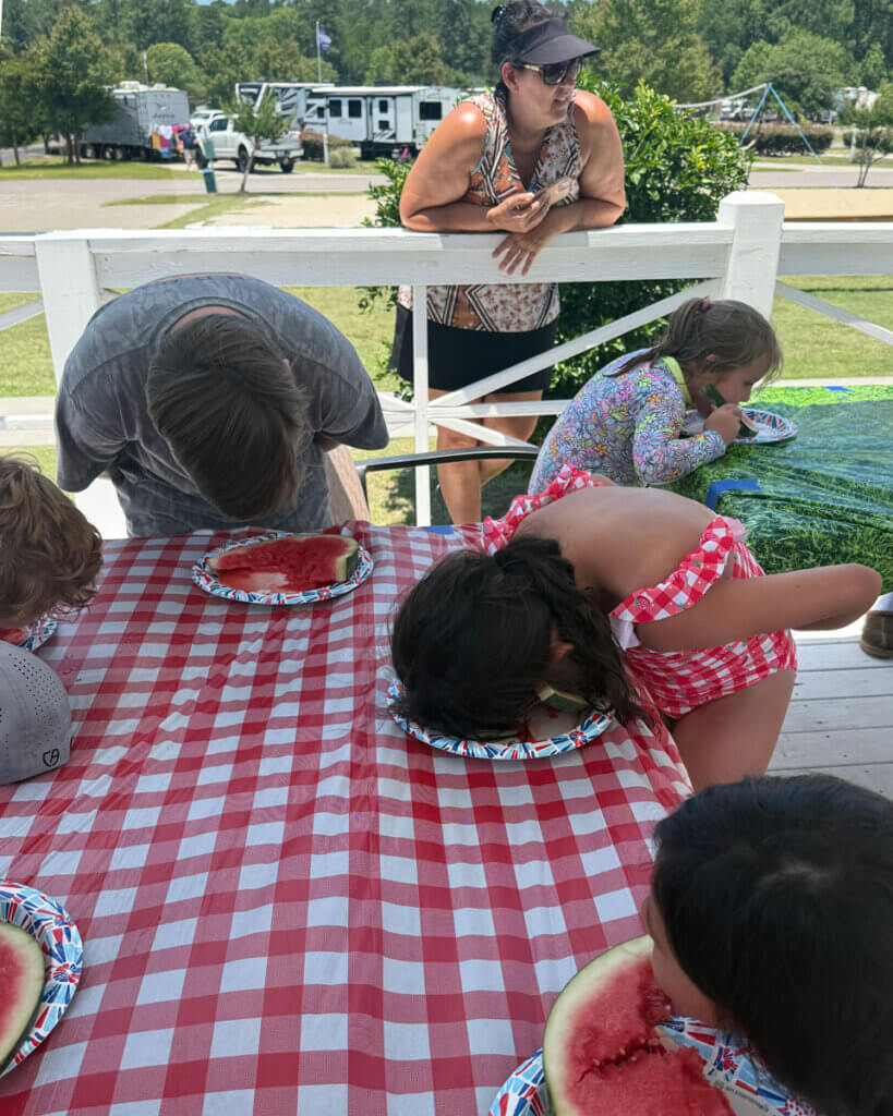 Guests at Creekfire RV Resort in Savannah, Georgia participating in a watermelon eating contest