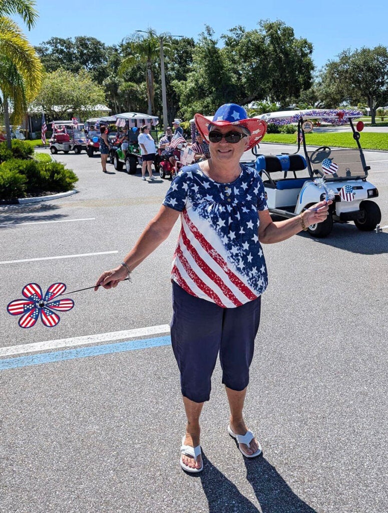 Resident from Camelot Lakes Village in Sarasota, Florida at the 4th of July Golf Cart Parade