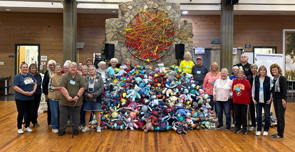 Guest and long term guests at Holiday RV Park in Leesburg, Florida volunteer their time at Camp Boggy Creek