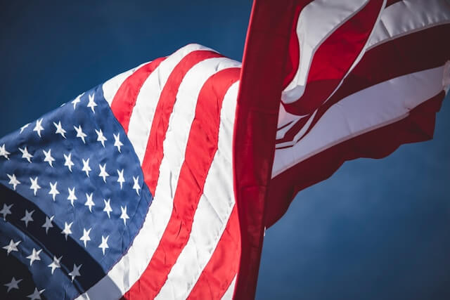 American Flag against a blue sky.