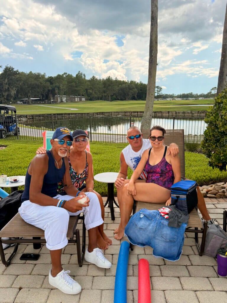 Residents celebrating the July 4th holiday weekend at Cypress Lakes Village in Lakeland, Florida with the golf course in the background.
