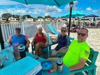 Residents celebrate the 4th of July with a pool party at The Meadows in Tarpon Springs, Florida