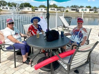 Residents celebrate the 4th of July with a pool party at The Meadows in Tarpon Springs, Florida