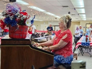 Residents celebrating Fourth of July at Holiday RV Park in Leesburg, Florida.