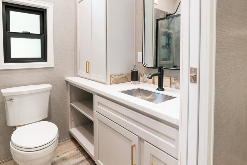 Birch Circle model cabin bathroom at Point Sebago Resort on Lake Sebago in Maine.