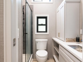 lake-sebago-cabins-birch-circle-13 Birch Circle model cabin bathroom at Point Sebago Resort on Lake Sebago in Maine.