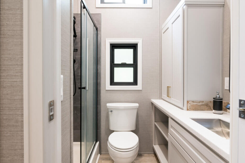 Birch Circle model cabin bathroom at Point Sebago Resort on Lake Sebago in Maine.