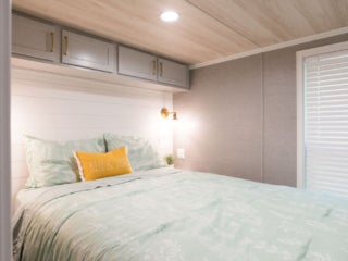 lake-sebago-cabins-birch-circle-9 Birch Circle model cabin bedroom at Point Sebago Resort on Lake Sebago in Maine.
