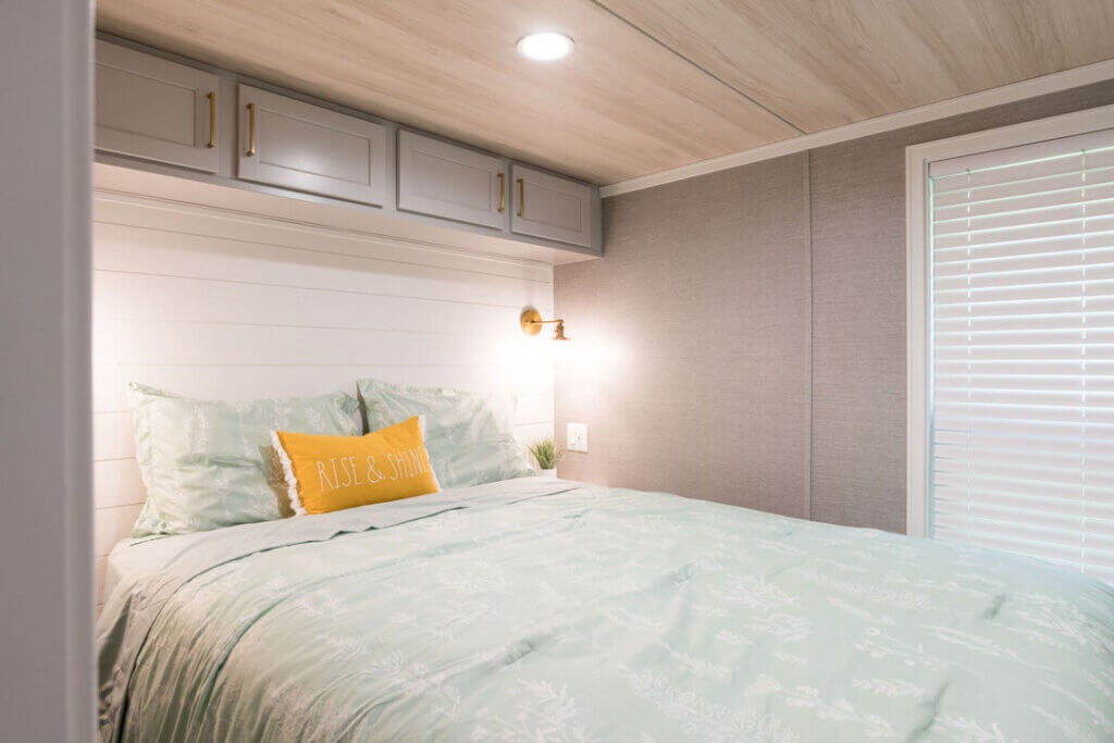 Birch Circle model cabin bedroom at Point Sebago Resort on Lake Sebago in Maine.