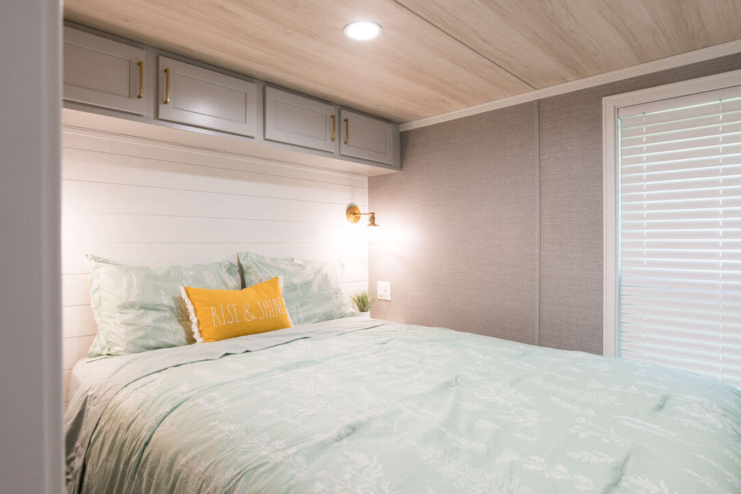 Birch Circle model cabin bedroom at Point Sebago Resort on Lake Sebago in Maine.