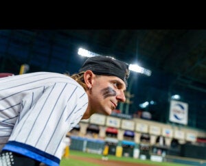 Baseball player at a stadium during a Texas Tailgaters Banana Ball game.