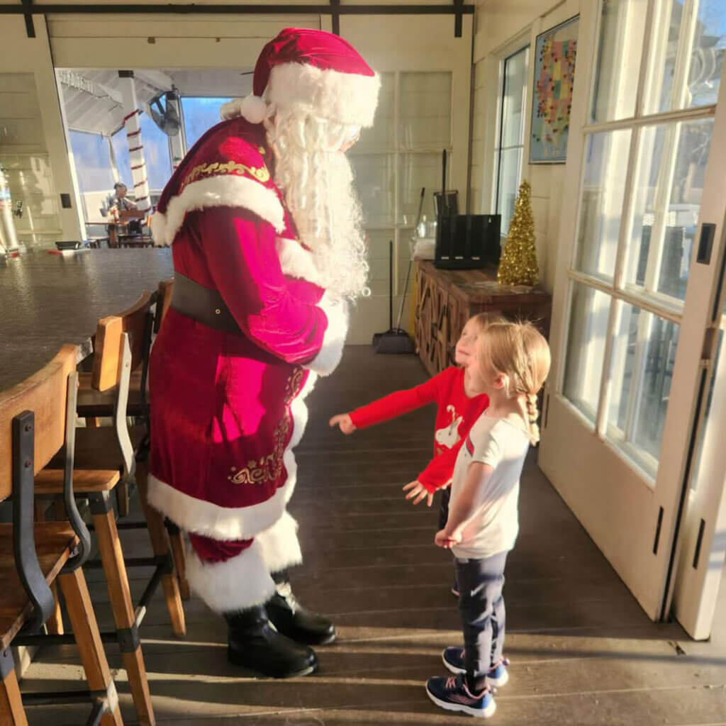 Santa talking to guests at CreekFire RV Resort in Savannah, Georgia