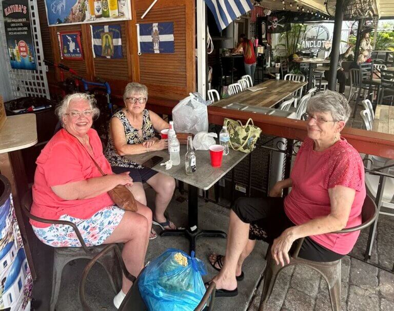Residents from 55+ community, Rolling Greens Village in Ocala, Florida, enjoy a greek lunch at Kazina's during their day trip to Tarpon Springs, Florida.