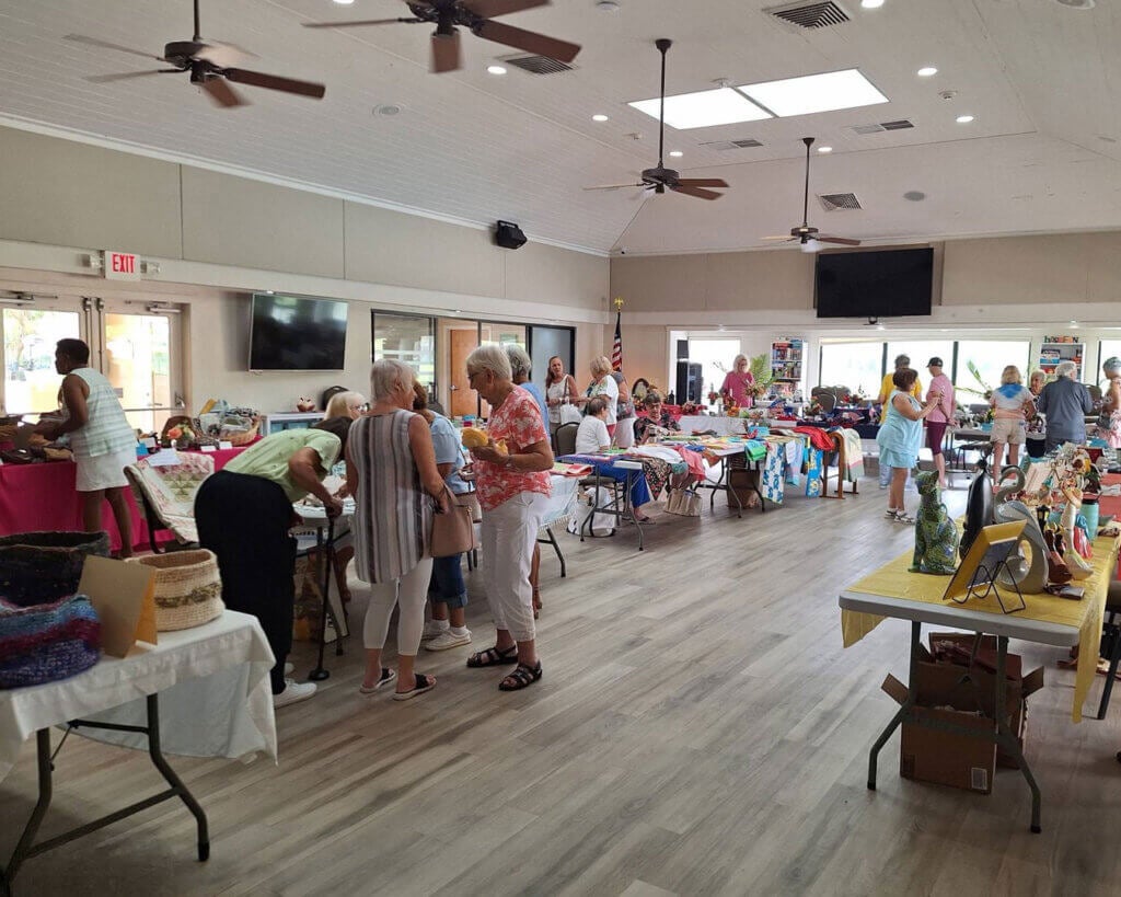 Residents of Camelot Lakes Village in Sarasota Village at the onsite Camelot Lakes Village Bazaar