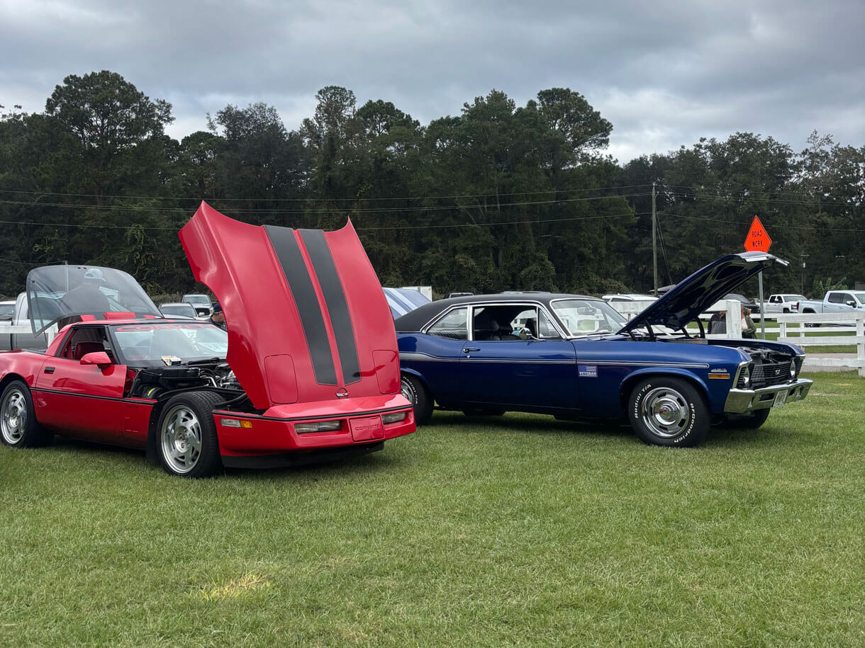 classic-car-show-creek-fire Two classic cars with the hoods up at the October 2026 CreekFire Car Show in Savannah, Georgia.