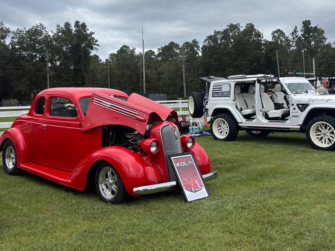vintage-car-show-creekfire A Plymouth Model P1 and a Jeep at the October 2026 CreekFire Car Show in Savannah, Georgia.