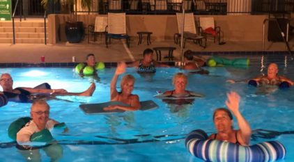 Residents of Camelot Lakes enjoy a night swim