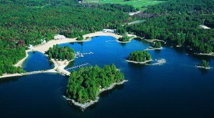 Aerial view of Point Sebago Beachfront and the tree line in the distance, Casco, Maine