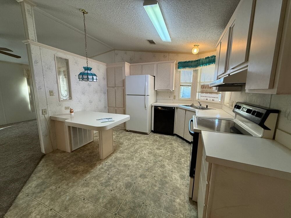 6411 Rolling Greens Dr