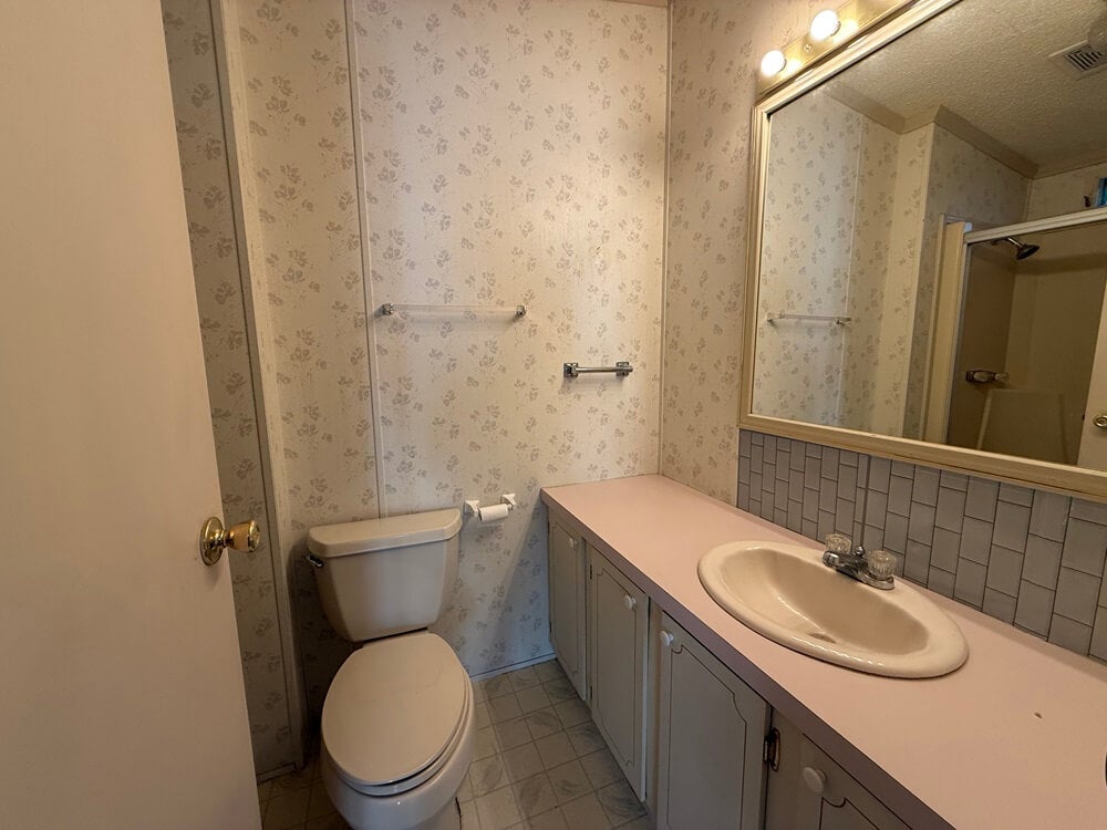 6411 Rolling Greens Dr